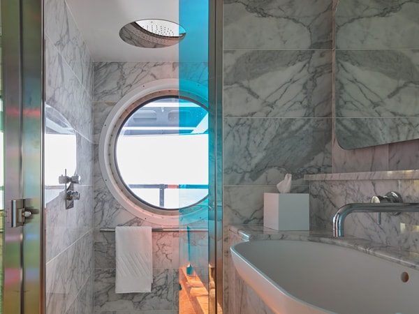 the bathroom inside the Sweet Aft Suite, Virgin Voyages’ Resilient Lady