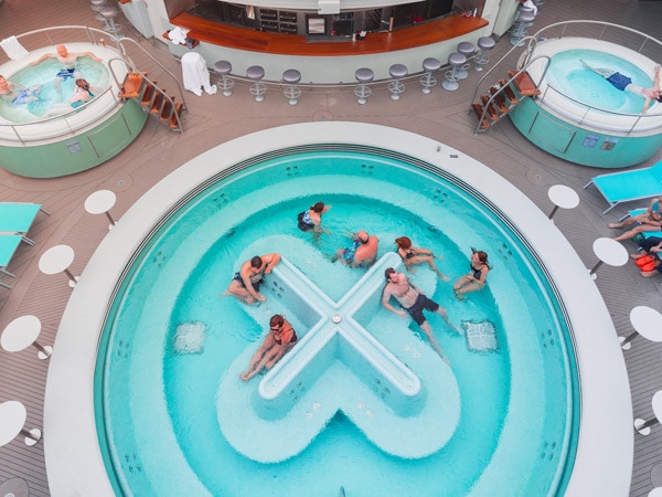 an overhead shot of the jacuzzi onboard Virgin Voyages’ Resilient Lady