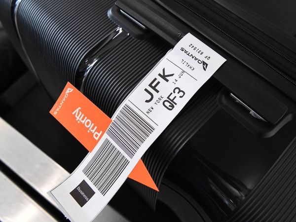 a luggage, Qantas Flight QF3 Auckland to New York