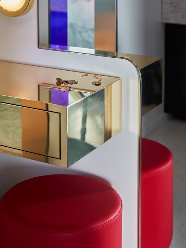Jewelry on vanity in RockStar Suite aboard Resilient Lady