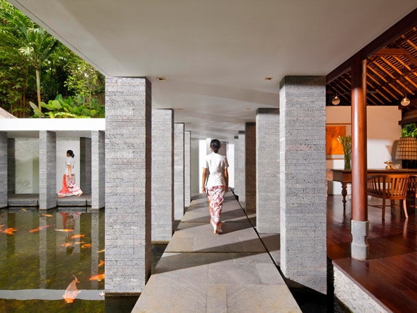 a lady walking along COMO Shambhala Estate