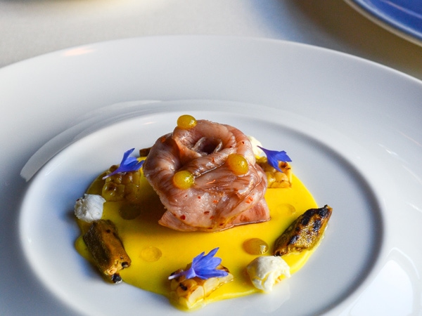a table-top view of food on a plate at AFICI, San Francisco