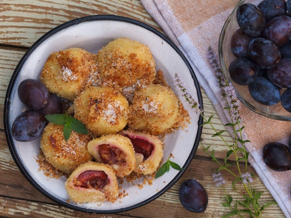 a plate of fruit dumplings in Prague