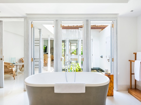 a huge bathtub in a garden pool villa at COMO Uma Ubud, Bali