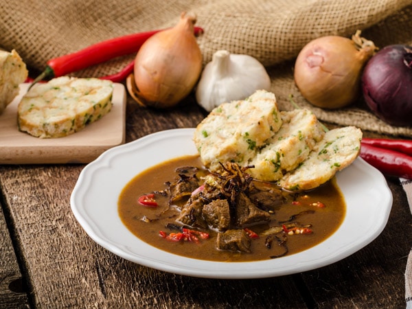 a plate of goulash in Prague