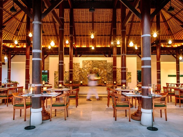 a vibrant dining interior at Kemiri, COMO Uma Ubud