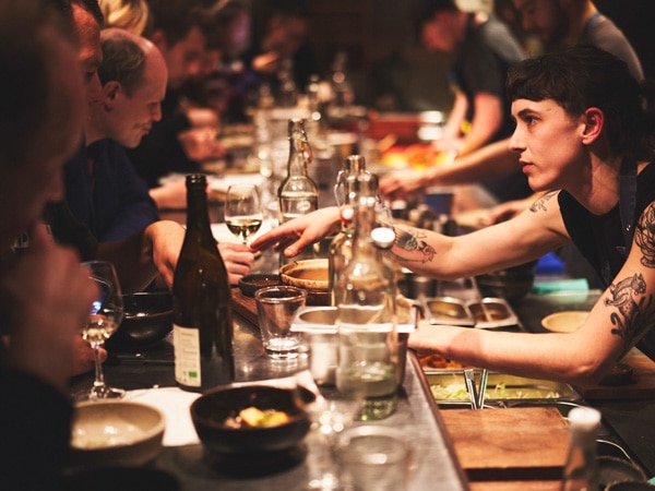 people having dinner at Kiln, London