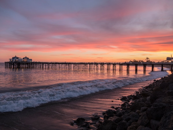 a fiery sunset at Malibu Pier