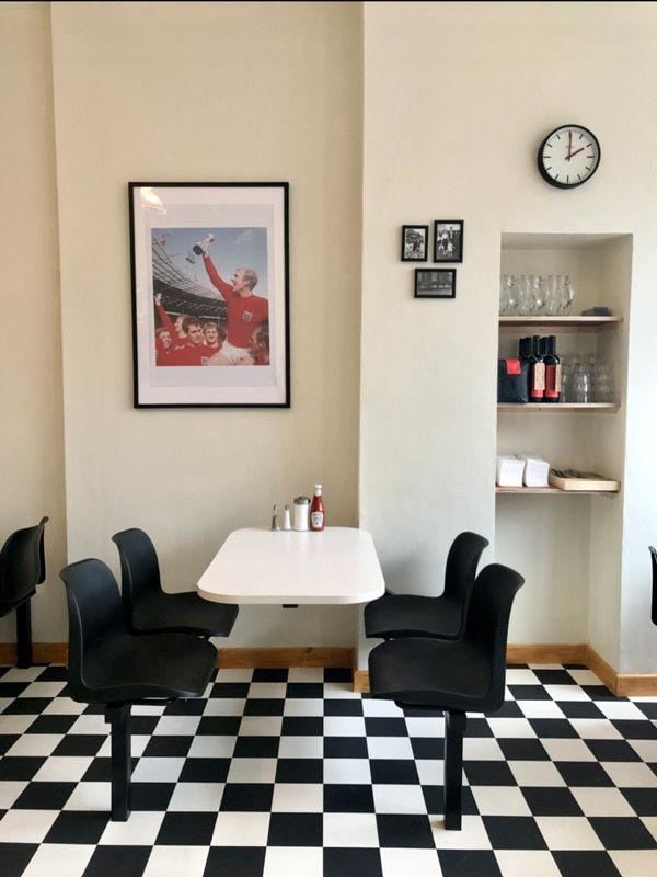 a retro-themed dining in Norman’s Cafe, London