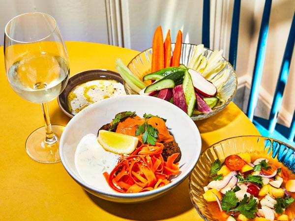 an array of dishes on the table at Wildseed, San Francisco
