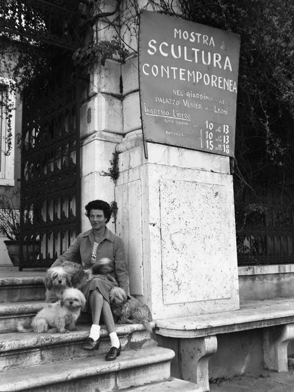 a black and white photo of Peggy Guggenheim