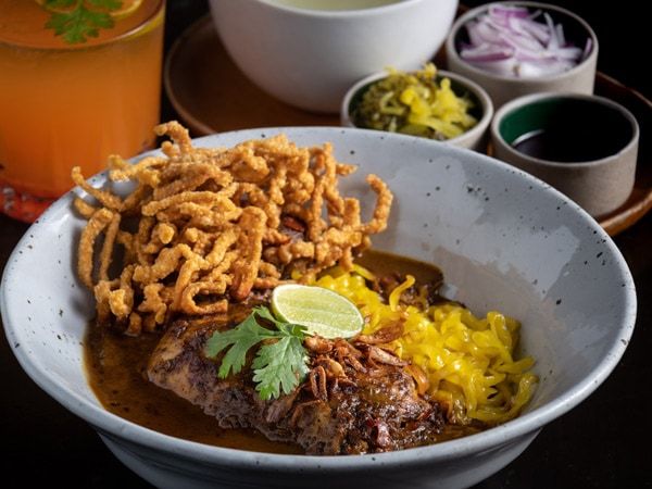 a bowl of Khao Soi in Chiang Mai