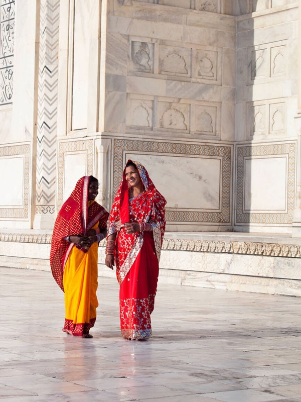women in colourful saris at the Taj Mahal, Agra, India