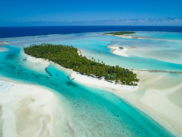 an aerial view of the white sand coastline, The Cook Islands