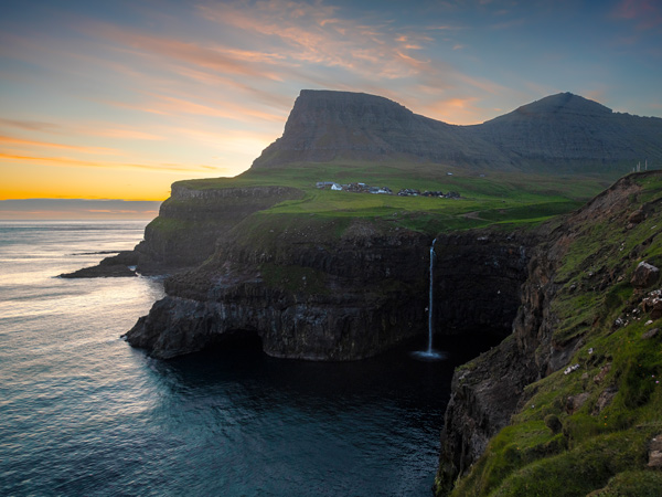 Múlafossur Waterfall at sunset, The Faroe Islands
