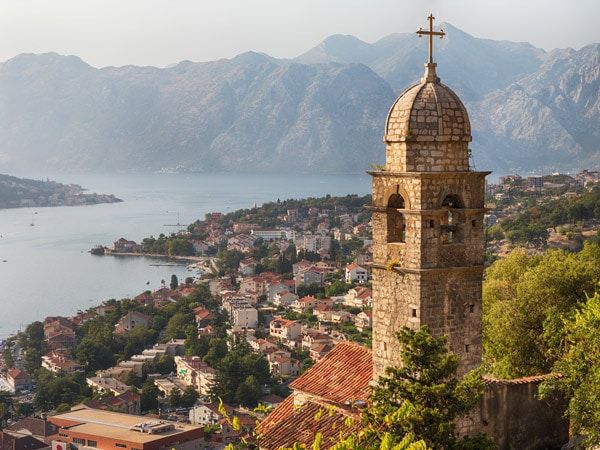 The Church of Our Lady of Remedy with Kotor town in the background at Montenegro, The Balkans 