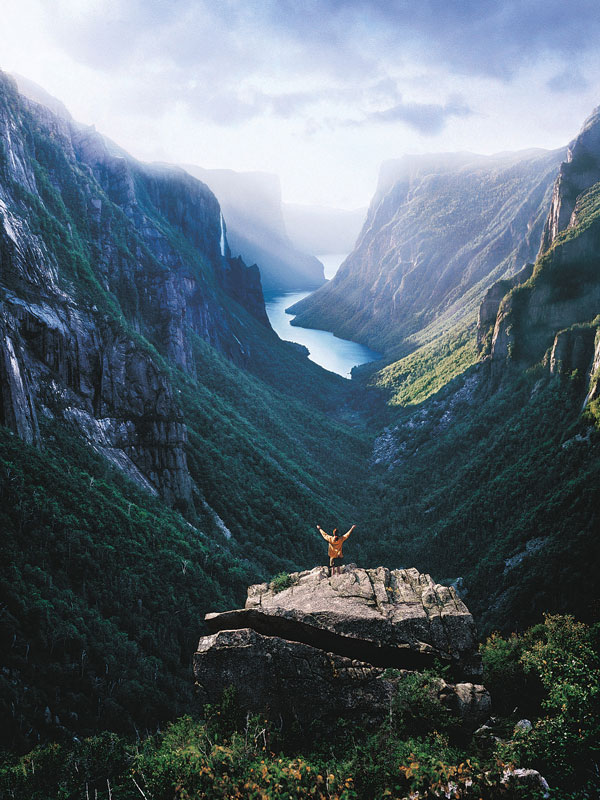a person standing on top of Western Brook Pond, Gros Morne National Park