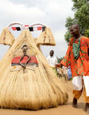 a voodoo mask in the Benin Annual Voodoo Festival