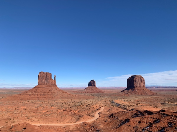 towering sandstone buttes in Goulding’s, Monument Valley, USA