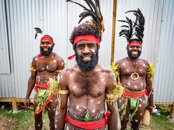 dancers wearing costume and headdress at the Melanesian Arts & Culture Festival