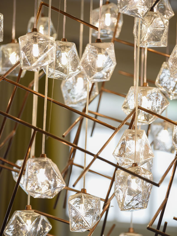 an elegant chandelier at Raffles Singapore