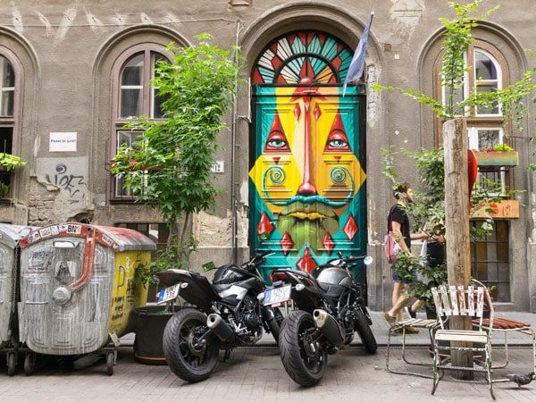 the exterior of Szimpla Kert ruin bar in the Jewish Quarter in Budapest, Hungary