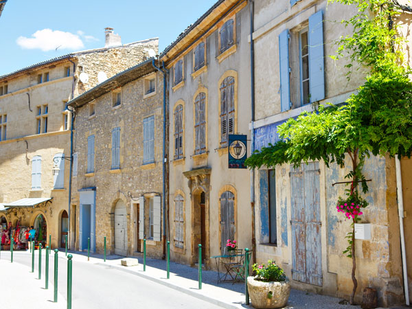 Aix-en-Provence on sunny summer day street with typical houses