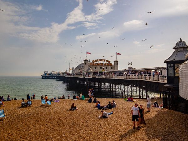 people enjoying at the seaside Brighton Pier
