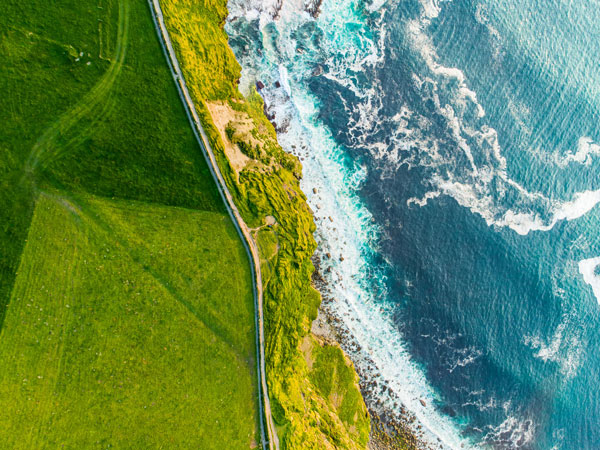 an aerial view of the Cliffs of Moher