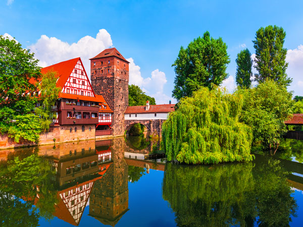 lush greenery and historic structures in the Old Town of Nuremberg