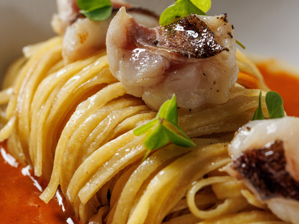 a close-up shot of pasta at Dogma, Rome