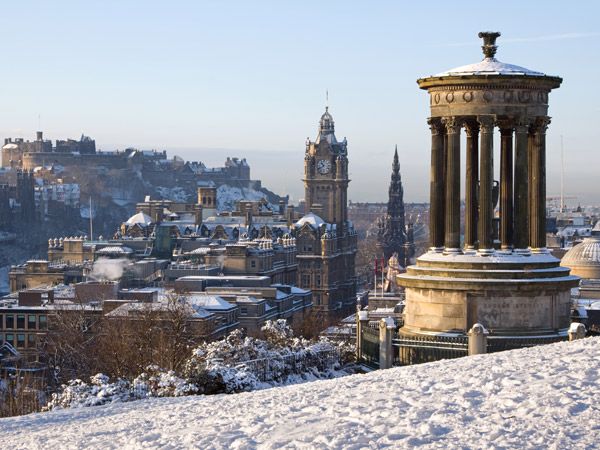 a scenic view of Edinburg covered with snow