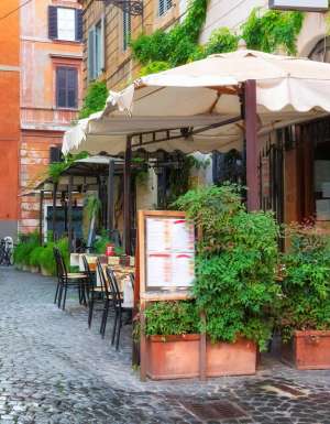 a Trastevere restaurant at an old street in Rome