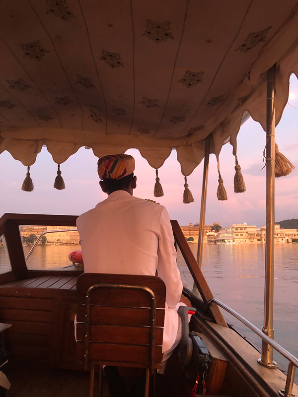 cruising along Lake Pichola at sunset