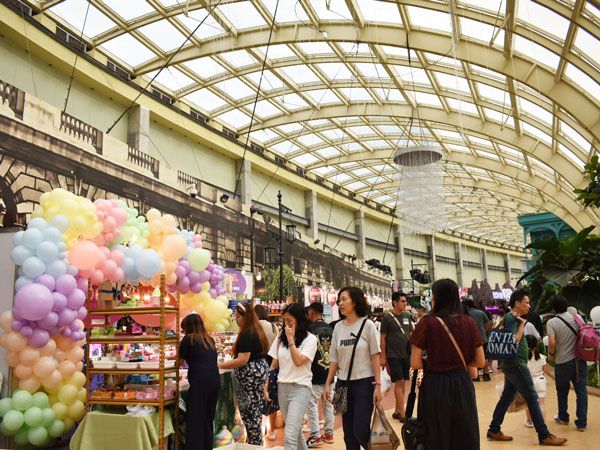 people browsing through the stalls in Noel Bazaar 2023 in Okada Manila