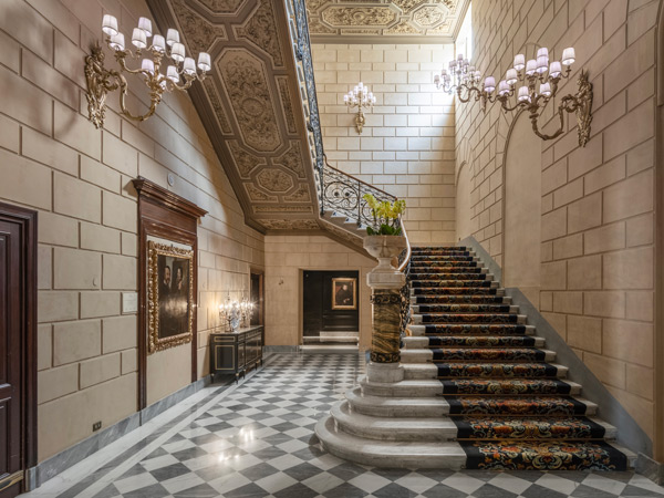 the elegant staircase at The St. Regis Rome