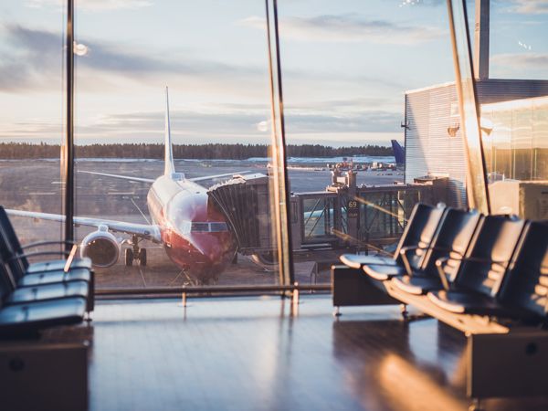 an empty airport lounge at sunrise