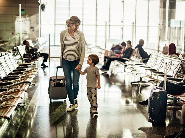 a pregnant woman travelling with a child
