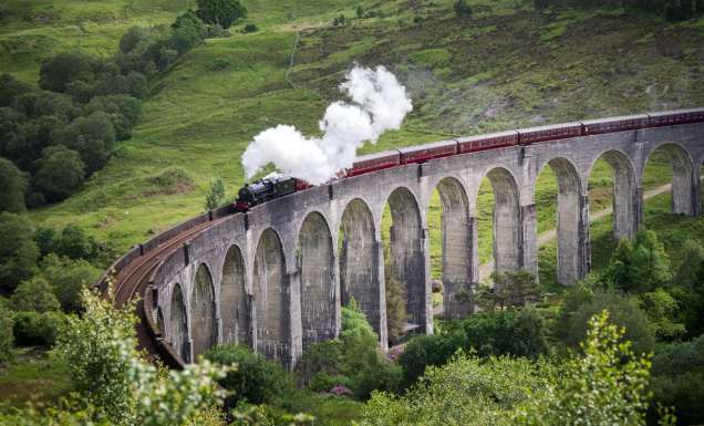 The Jacobite going over the Glenfinnan Viaduct in Scotland