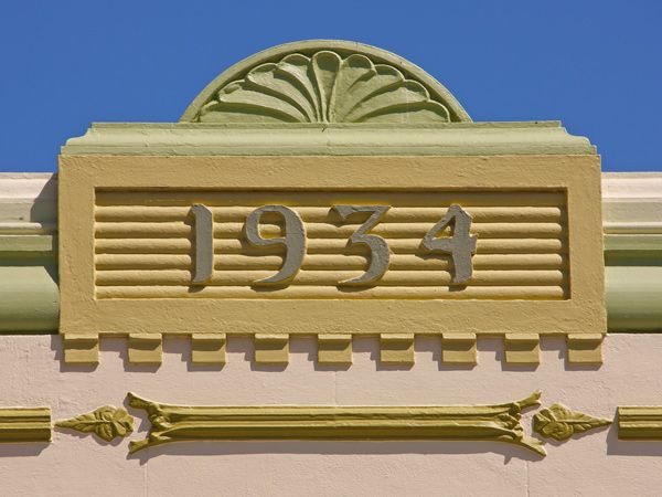 1934 sign in Art Deco style on a building in Napier, New Zealand
