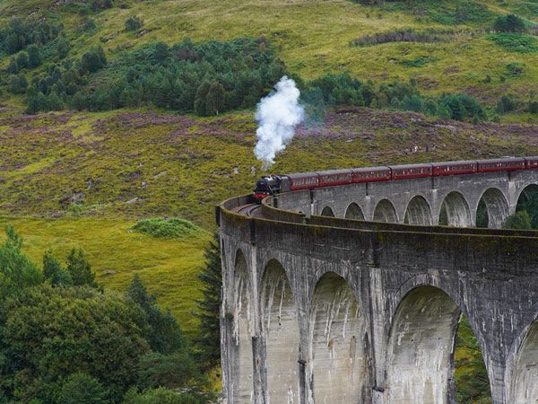 The Jacobite going over the Glenfinnan Viaduct in Scotland