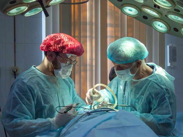 doctors operating on a patient
