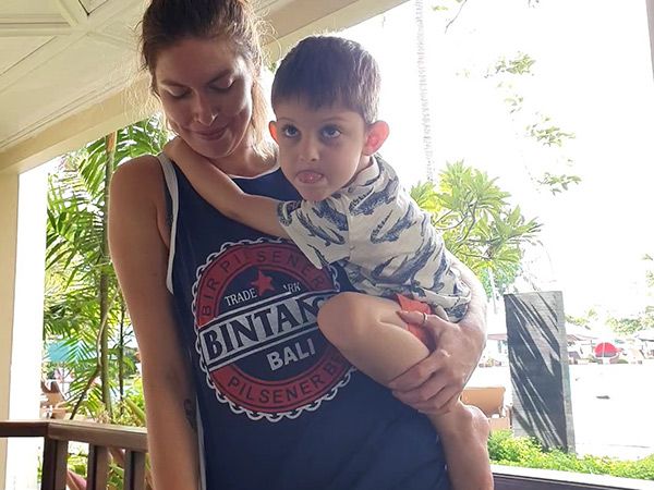 Kassia Byrnes and nephew with bintang singlet in bali