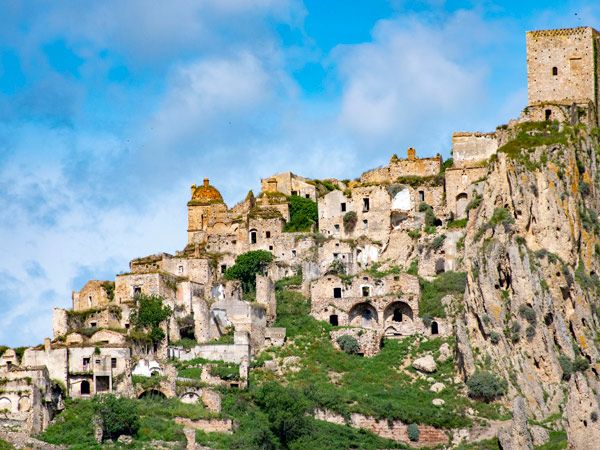 a cliff-side ghost town in Craco, Italy