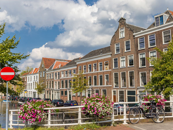flowers at a bridge over a historic canal in Leiden, Netherlands