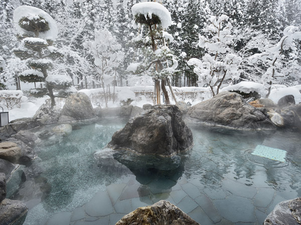an open hot spring in winter