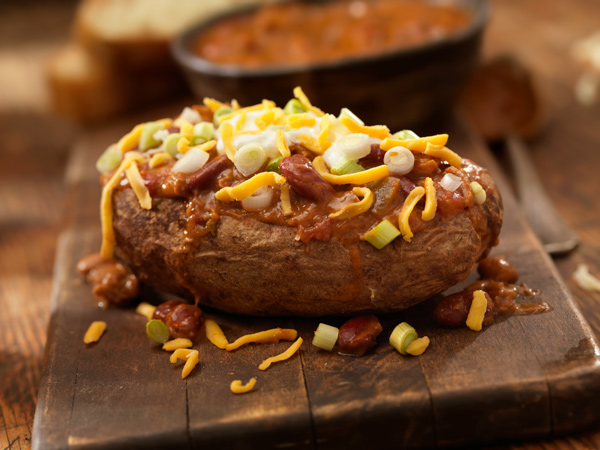 a baked potato with chili