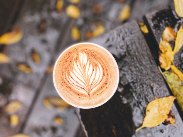 a top view of a cup of coffee with latte art at Bongo Java, Nashville