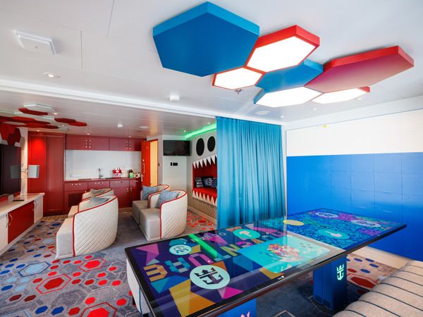 the media room with a gaming table at the ultimate family townhouse, Icon of the Seas