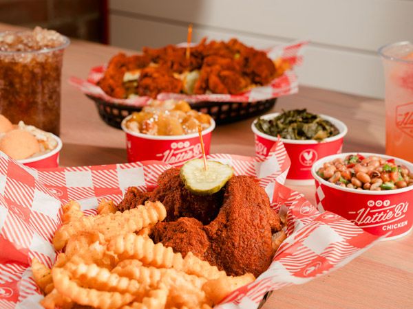 a spread of food on the table at Hattie B’s Hot Chicken, Nashville